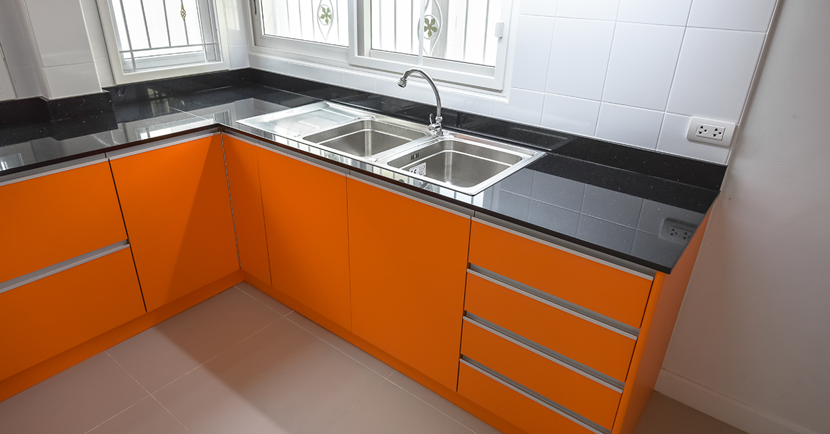 Kitchen painted in black and orange