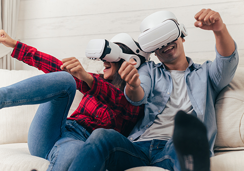 Two Friends Enjoying VR Game
