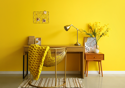 Bright yellow wall for study room