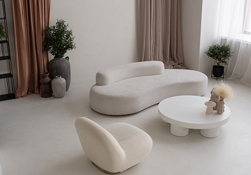 Round White Sofas In A Living Room