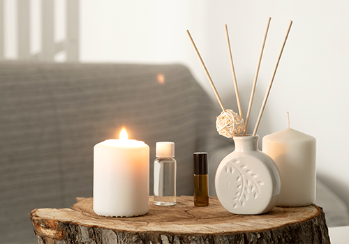 Candle And Incense Sticks On Wooden Base