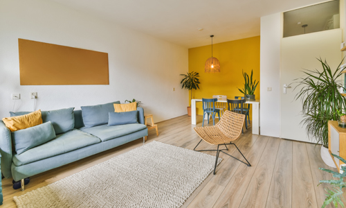 yellow accent wall in living room